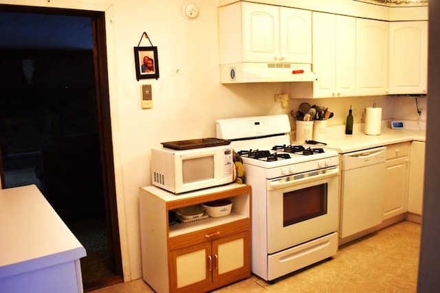 465 18th St, West Babylon, NY 11704 - kitchen with white appliances, under cabinet range hood, and light countertops