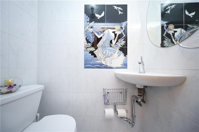 2179 E 26th St, Brooklyn, NY 11229 - bathroom featuring toilet and tile walls