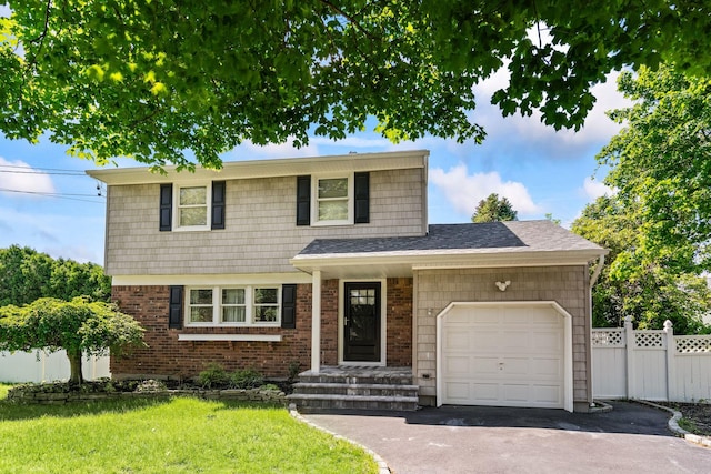 170 Lenox St, Port Jefferson Station, NY 11776 - view of front of property featuring an attached garage, asphalt driveway, brick siding, and a shingled roof