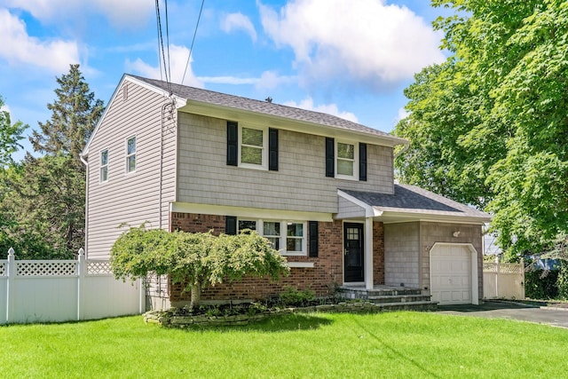 170 Lenox St, Port Jefferson Station, NY 11776 - view of front facade featuring an attached garage, driveway, brick siding, and a shingled roof
