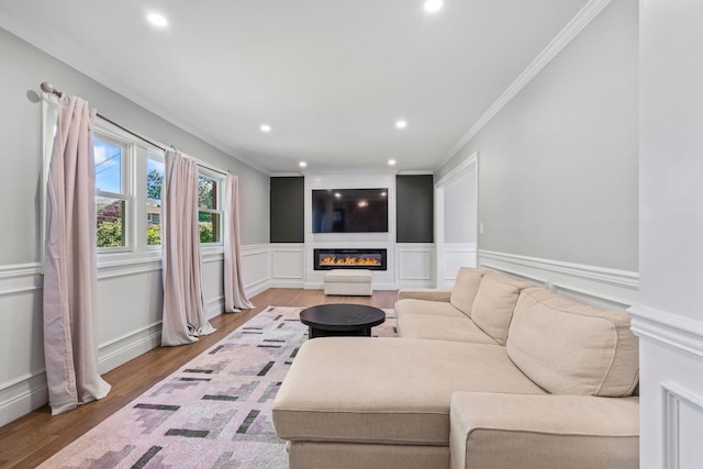 170 Lenox St, Port Jefferson Station, NY 11776 - living room with crown molding, a fireplace, wood finished floors, recessed lighting, and wainscoting