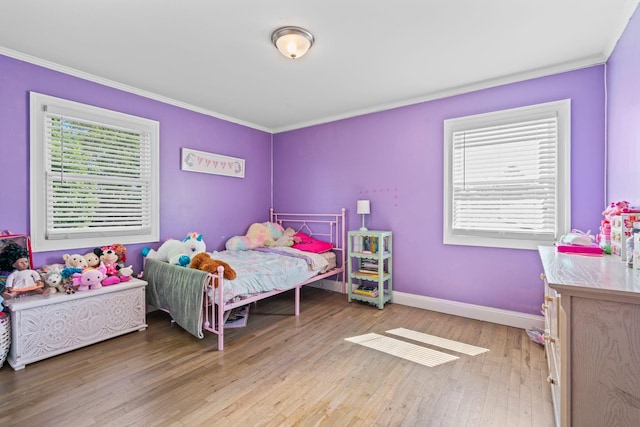 170 Lenox St, Port Jefferson Station, NY 11776 - bedroom featuring ornamental molding, hardwood / wood-style flooring, and baseboards