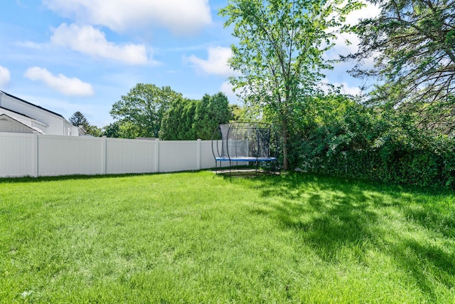 170 Lenox St, Port Jefferson Station, NY 11776 - view of yard with a trampoline