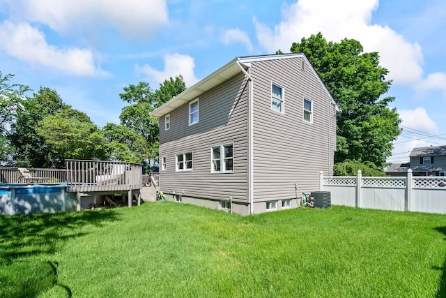 170 Lenox St, Port Jefferson Station, NY 11776 - rear view of property featuring a deck and central AC unit