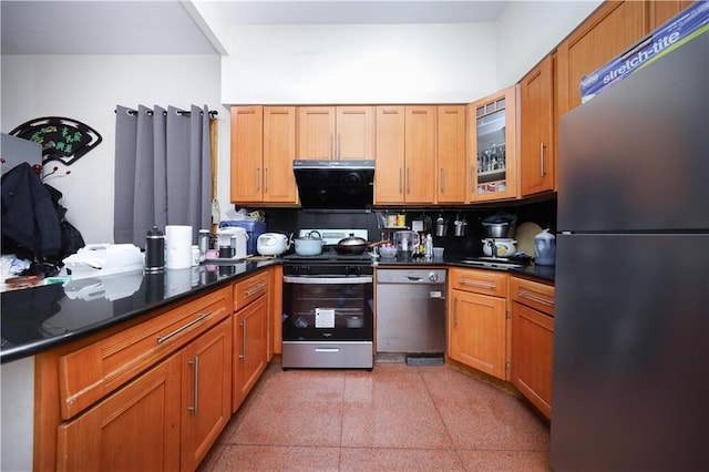462 52nd St Unit 2D, Brooklyn, NY 11220 - kitchen with appliances with stainless steel finishes, dark countertops, glass insert cabinets, and brown cabinets