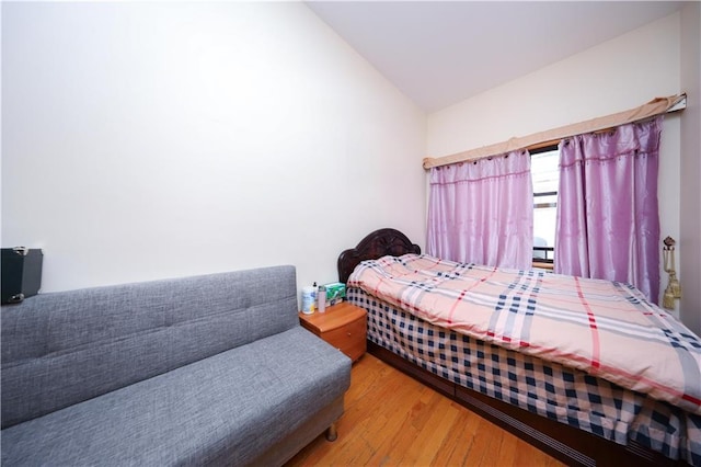 462 52nd St Unit 2D, Brooklyn, NY 11220 - bedroom with wood finished floors and lofted ceiling