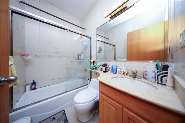 462 52nd St Unit 2D, Brooklyn, NY 11220 - bathroom featuring toilet, vanity, and combined bath / shower with glass door