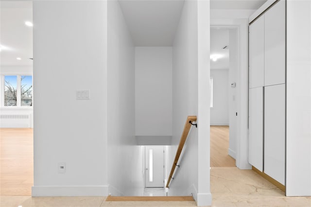 29 Calvert Dr Unit 211, Monsey, NY 10952 - hallway featuring an upstairs landing, baseboards, recessed lighting, and light wood-type flooring