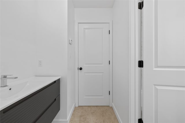 29 Calvert Dr Unit 211, Monsey, NY 10952 - bathroom with vanity and baseboards