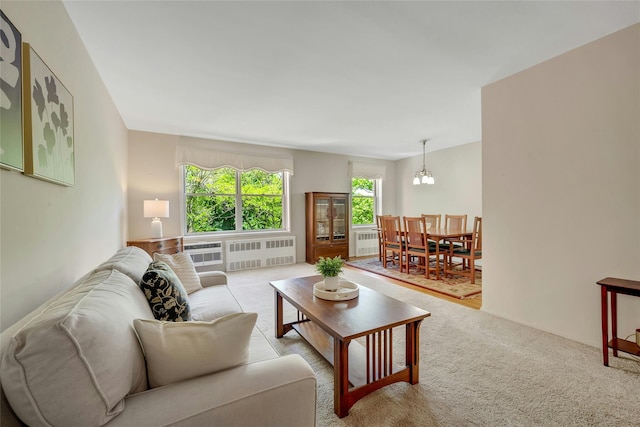 177 E Hartsdale Ave Unit 5L, Hartsdale, NY 10530 - carpeted living room featuring radiator heating unit