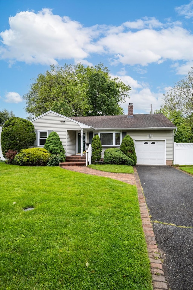 29 Newmarket Rd, Syosset, NY 11791 - ranch-style house with a garage, asphalt driveway, and a chimney