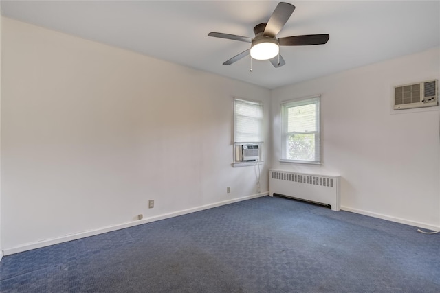 29 Newmarket Rd, Syosset, NY 11791 - spare room with radiator heating unit, a wall unit AC, ceiling fan, and baseboards