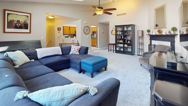 235 Panorama Ct, Poughkeepsie, NY 12603 - living room featuring light colored carpet, ceiling fan, lofted ceiling, and baseboards