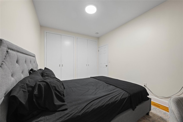 1372 Shakespeare Ave Unit 3A, Bronx, NY 10452 - bedroom with wood finished floors, multiple closets, and baseboards
