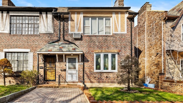 82-60 166th St, Jamaica, NY 11432 - view of front of house featuring brick siding