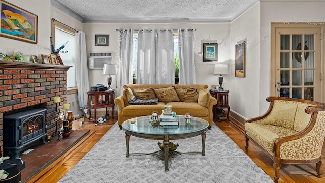 82-60 166th St, Jamaica, NY 11432 - living area featuring a textured ceiling, baseboards, a wall mounted air conditioner, a wood stove, and ornamental molding