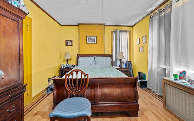 82-60 166th St, Jamaica, NY 11432 - bedroom with ornamental molding and light wood finished floors