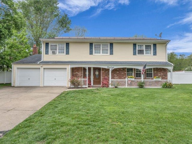 38 Nadine Ln, Port Jefferson Station, NY 11776 - traditional-style home featuring a porch, driveway, and brick siding