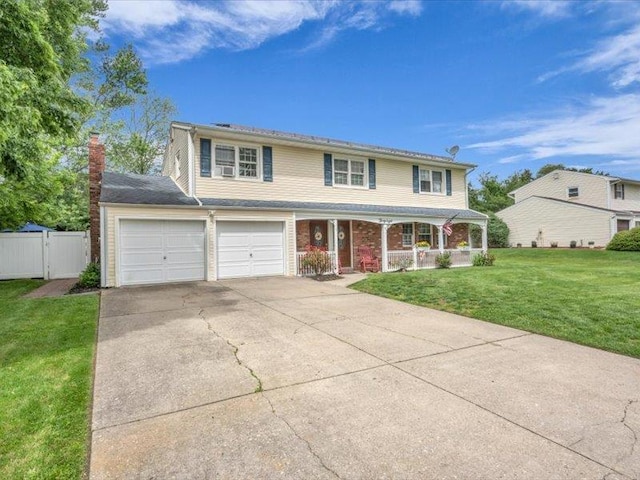 38 Nadine Ln, Port Jefferson Station, NY 11776 - traditional-style house featuring a porch, driveway, a chimney, brick siding, and a gate
