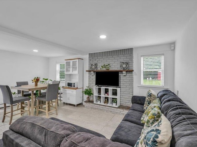 38 Nadine Ln, Port Jefferson Station, NY 11776 - tiled living room with recessed lighting