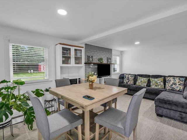 38 Nadine Ln, Port Jefferson Station, NY 11776 - dining area featuring recessed lighting, beamed ceiling, and a baseboard heating unit