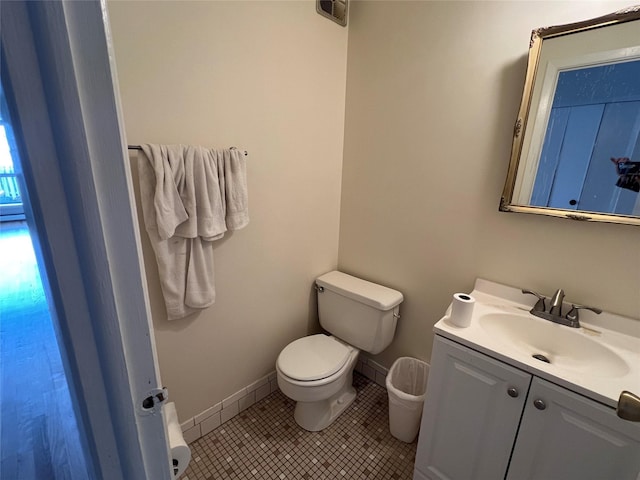 750 Lido Blvd Unit 71A, Lido Beach, NY 11561 - bathroom with toilet, vanity, tile patterned flooring, and baseboards