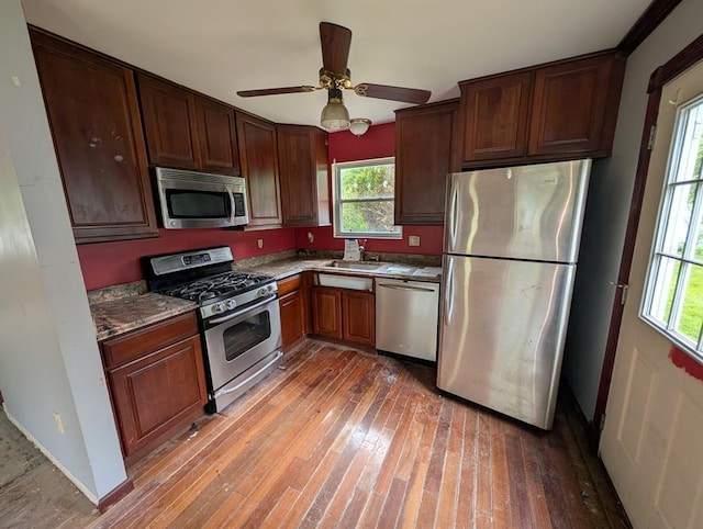 119 Mailler Ave, Cornwall, NY 12518 - kitchen featuring appliances with stainless steel finishes, a sink, hardwood / wood-style floors, and ceiling fan