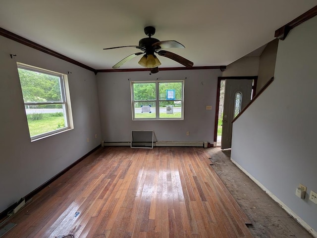 119 Mailler Ave, Cornwall, NY 12518 - unfurnished living room with wood-type flooring, crown molding, ceiling fan, and baseboards