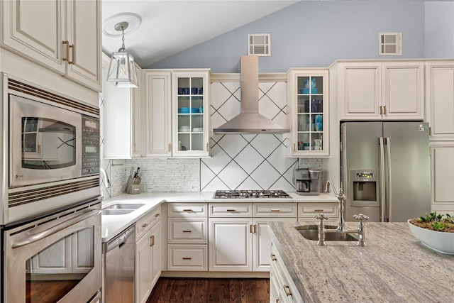 25 Cliff Rd W, Wading River, NY 11792 - kitchen featuring stainless steel appliances, a sink, wall chimney range hood, lofted ceiling, and light stone countertops