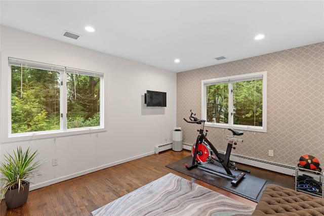 25 Cliff Rd W, Wading River, NY 11792 - workout room with baseboards, wood finished floors, wallpapered walls, recessed lighting, and an accent wall