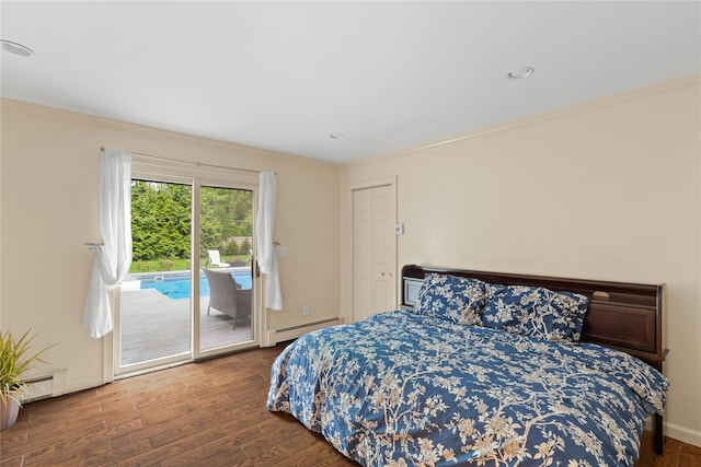 25 Cliff Rd W, Wading River, NY 11792 - bedroom featuring a baseboard radiator, access to exterior, wood finished floors, ornamental molding, and baseboards