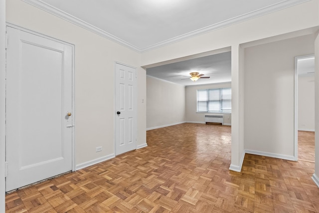 640 W 231st St Unit 2D, Bronx, NY 10463 - empty room featuring radiator, ornamental molding, baseboards, and a ceiling fan