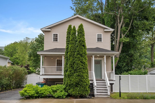 63 Liberty St, Beacon, NY 12508 - traditional-style house with a porch and a shingled roof
