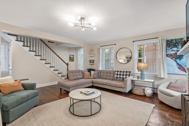 63 Liberty St, Beacon, NY 12508 - living area with hardwood / wood-style floors, stairway, a chandelier, and baseboards