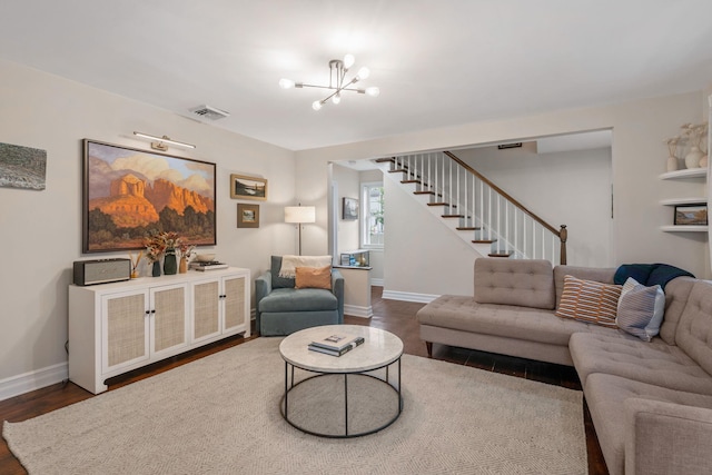 63 Liberty St, Beacon, NY 12508 - living room featuring stairs, wood finished floors, a chandelier, and baseboards