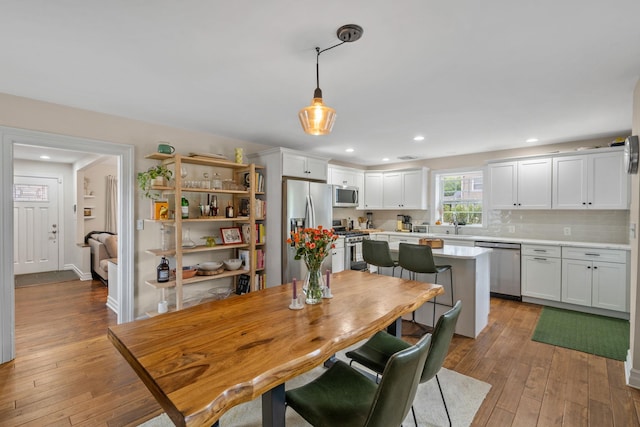 63 Liberty St, Beacon, NY 12508 - dining area with light wood-style flooring and recessed lighting