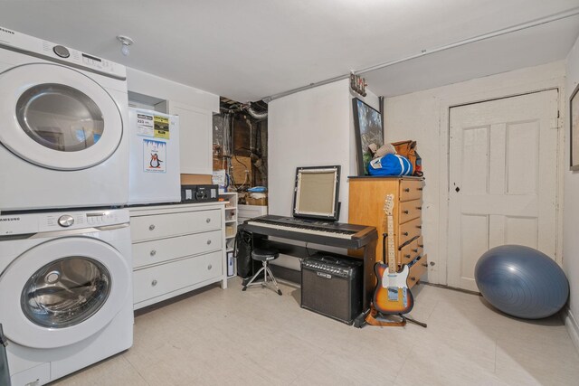 63 Liberty St, Beacon, NY 12508 - laundry room with stacked washer / dryer and light floors