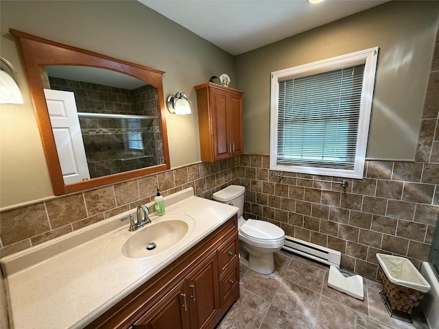 286 Berwick Ct Unit A, Ridge, NY 11961 - bathroom with a baseboard heating unit, tile walls, toilet, vanity, and a tile shower