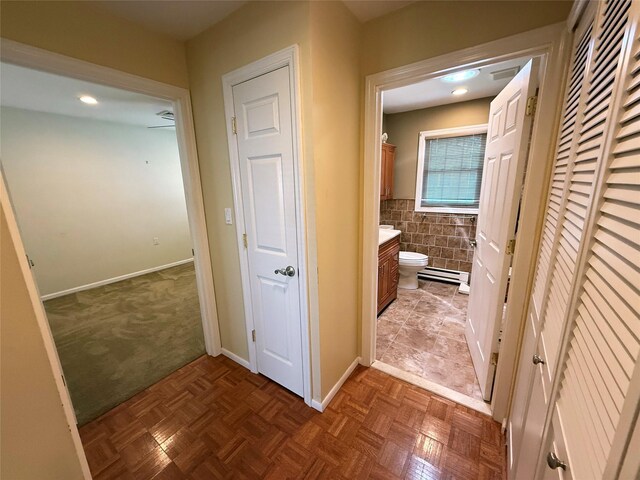 286 Berwick Ct Unit A, Ridge, NY 11961 - bathroom with vanity, a closet, toilet, and baseboards