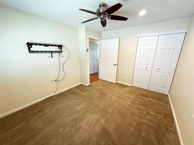 286 Berwick Ct Unit A, Ridge, NY 11961 - unfurnished bedroom featuring carpet, baseboards, ceiling fan, and a closet