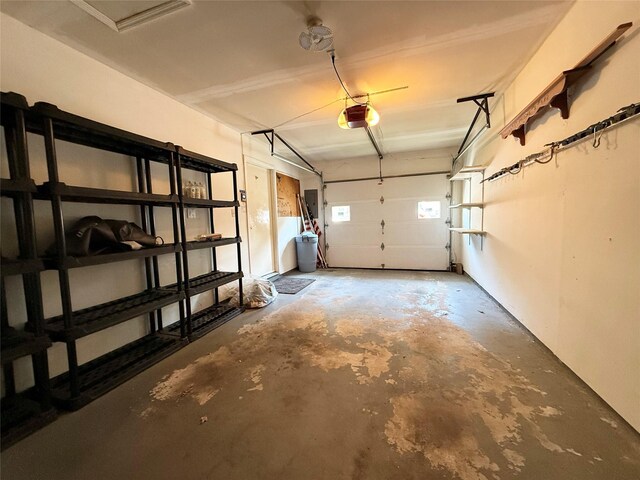 286 Berwick Ct Unit A, Ridge, NY 11961 - garage featuring a garage door opener