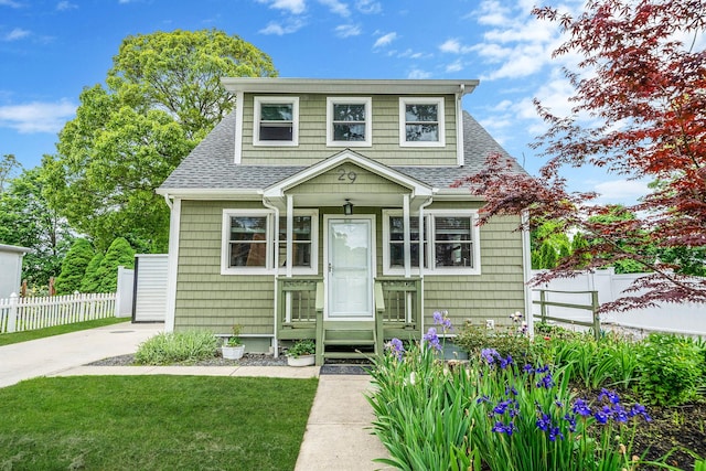 29 Montauk St, Selden, NY 11784 - bungalow featuring roof with shingles