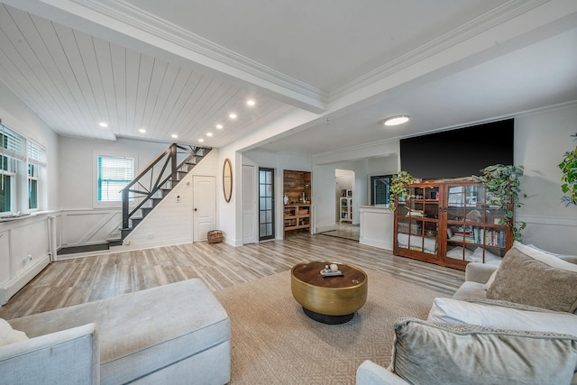 29 Montauk St, Selden, NY 11784 - living area with wood finished floors, stairway, ornamental molding, recessed lighting, and a wainscoted wall