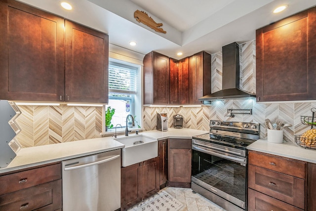 29 Montauk St, Selden, NY 11784 - kitchen featuring stainless steel appliances, wall chimney range hood, a sink, light countertops, and decorative backsplash