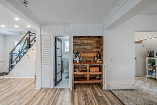 29 Montauk St, Selden, NY 11784 - bar area featuring ornamental molding, stairway, wood finished floors, recessed lighting, and baseboards