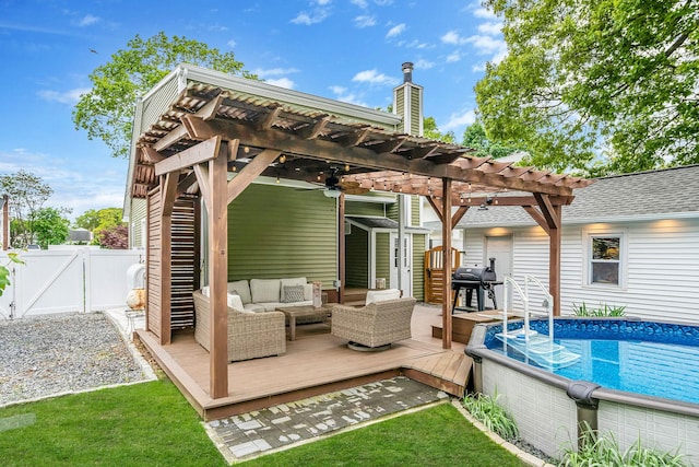 29 Montauk St, Selden, NY 11784 - back of property featuring a wooden deck, a pergola, outdoor lounge area, a gate, and ceiling fan