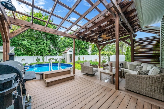 29 Montauk St, Selden, NY 11784 - wooden deck with an outdoor living space, a fenced backyard, and a pergola