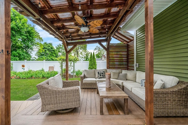 29 Montauk St, Selden, NY 11784 - wooden terrace with outdoor lounge area, a fenced backyard, and a ceiling fan