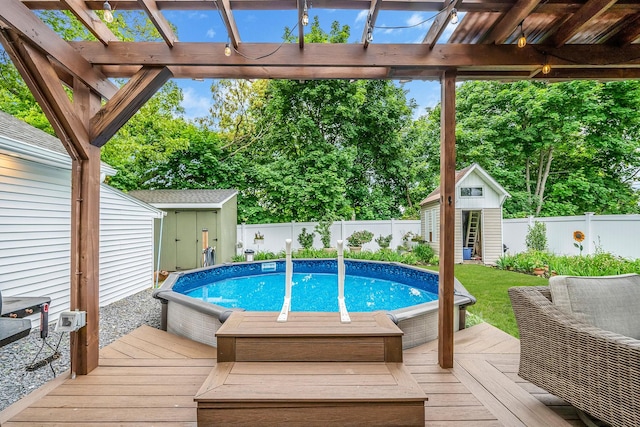 29 Montauk St, Selden, NY 11784 - view of swimming pool with a wooden deck, a fenced backyard, and a pergola