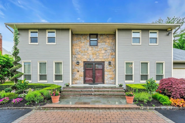 8 Victor Ln, Woodbury, NY 11797 - view of front of house with stone siding